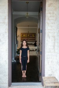 Kids blog post GIGI doorway | Kelly Williams Photography young girl standing in doorway | How to get your child a modeling agent in Dallas, Texas 2025