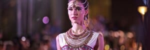 Model wearing Indian dress and headpiece